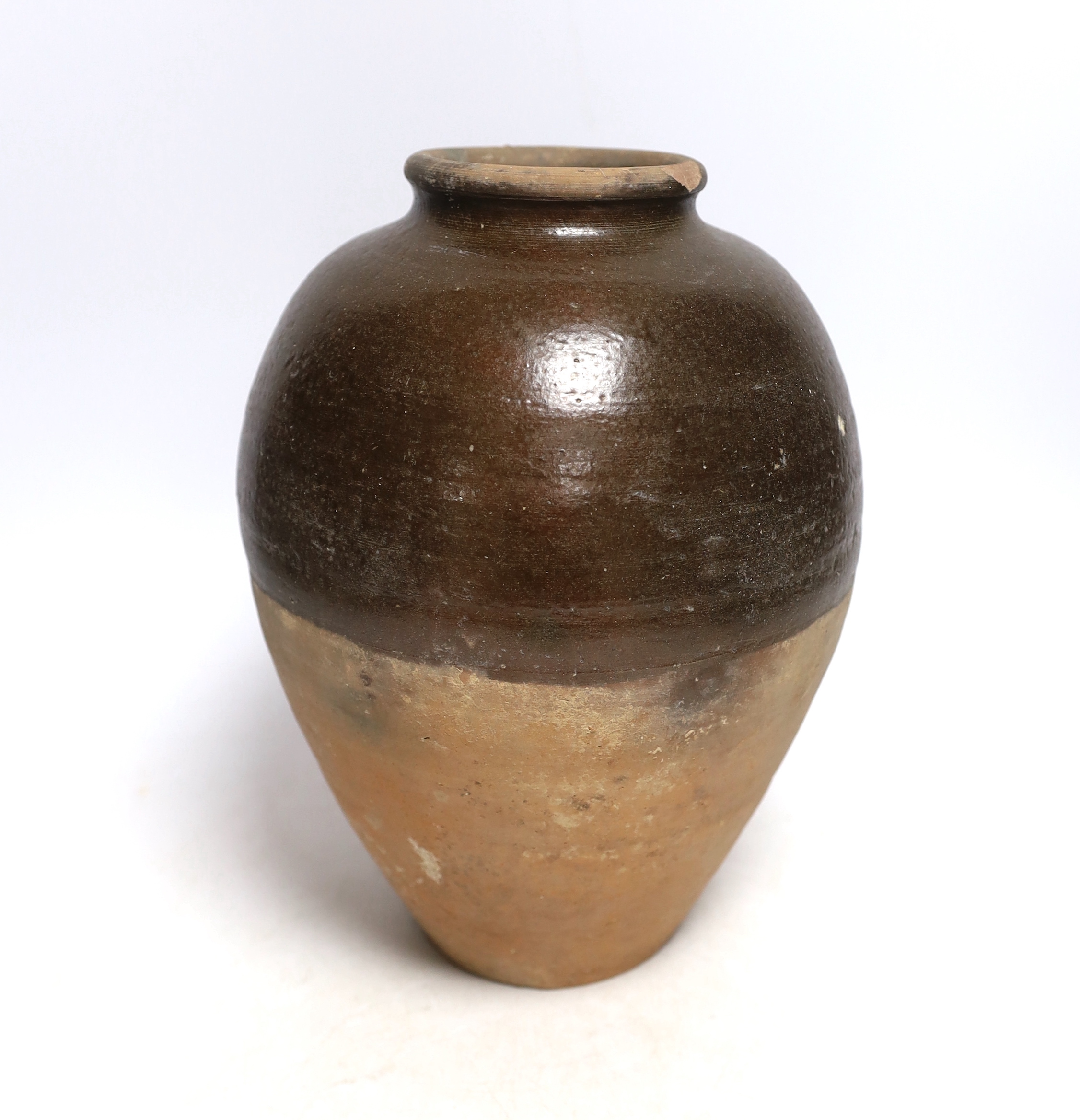 A Chinese brown partially glazed jar, Tang dynasty, 26cm